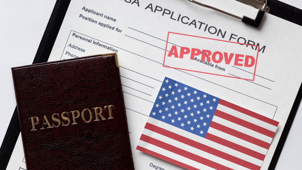 EB-2 NIW Denial Approved U.S. visa application form with passport and American flag
